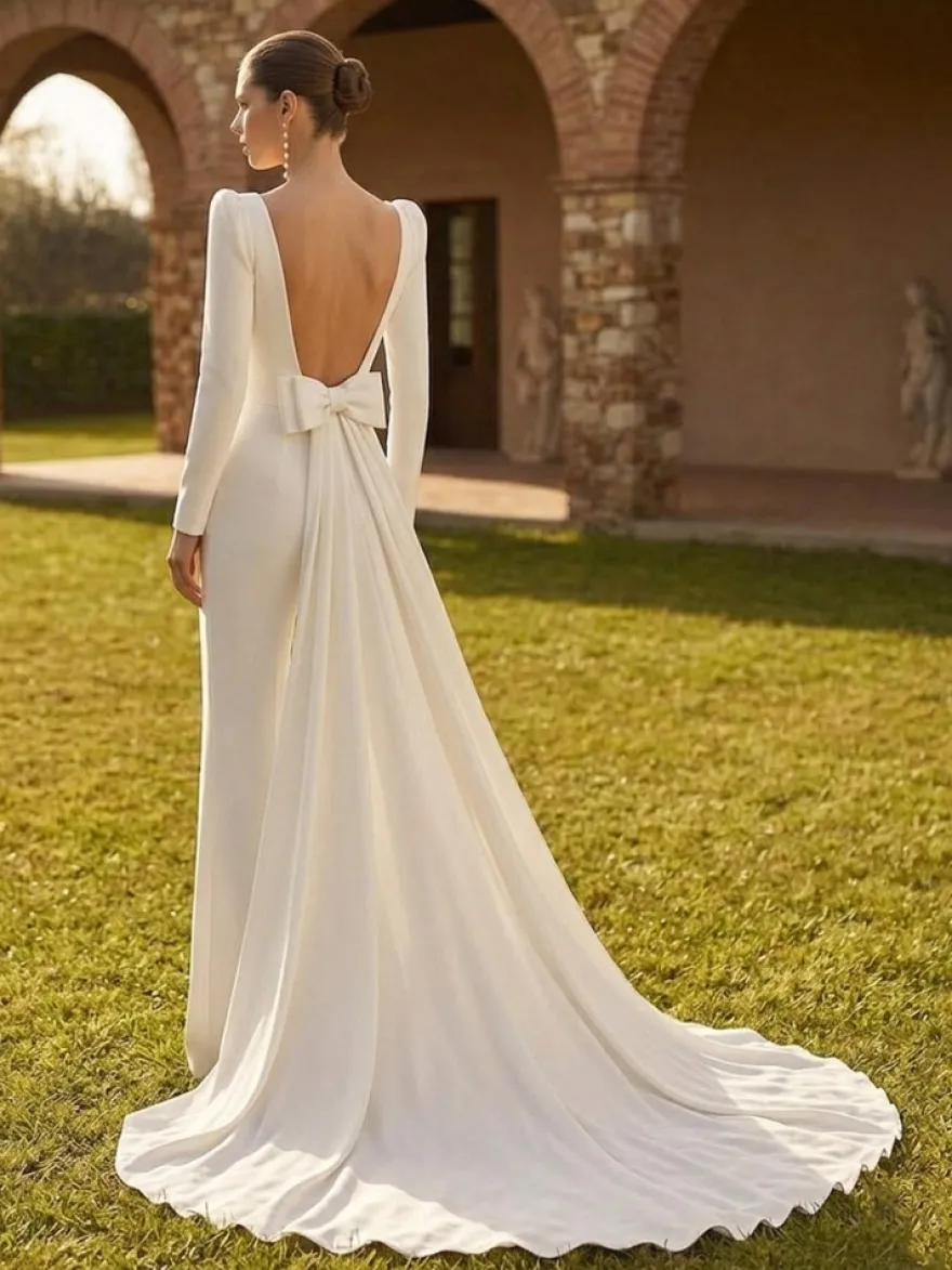 Combinaison de mariée 2 pièces en crêpe stretch avec nœuds et traîne col carré manches longues taille naturelle couleur ivoire