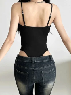 Combinaison moulante à bretelles spaghetti et découpes pour femme style bandage en résille coupe ajustée idéale pour les soirées en club.