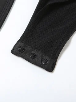 Combinaison moulante à bretelles spaghetti et découpes pour femme style bandage en résille coupe ajustée idéale pour les soirées en club.