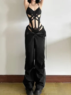 Combinaison moulante à bretelles spaghetti et découpes pour femme style bandage en résille coupe ajustée idéale pour les soirées en club.