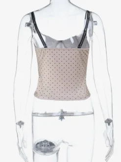 Débardeur corset à pois en dentelle contrastée fines bretelles spaghetti bustier court structuré.