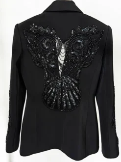 Ensemble blazer et pantalon en tulle noir à col en V en crêpe à sequins.