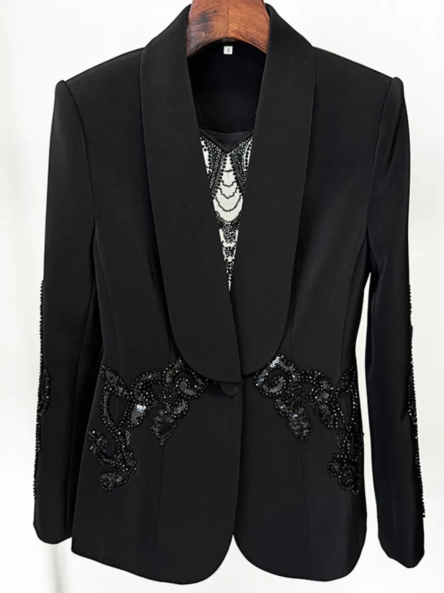 Ensemble blazer et pantalon en tulle noir à col en V en crêpe à sequins.