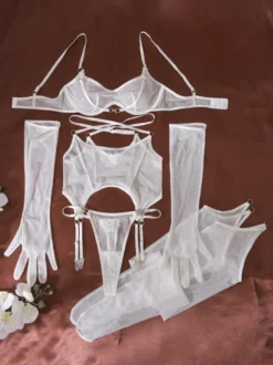 Ensemble de lingerie body en résille transparente noire et blanche avec longs gants et harnais ajouré