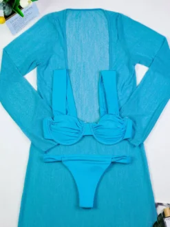 Ensemble de maillot de bain et cache-maillot bleu athlétique à manches longues et dos nageur.