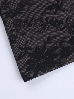Ensemble deux pièces jupe courte à bretelles et dos nu en dentelle noire