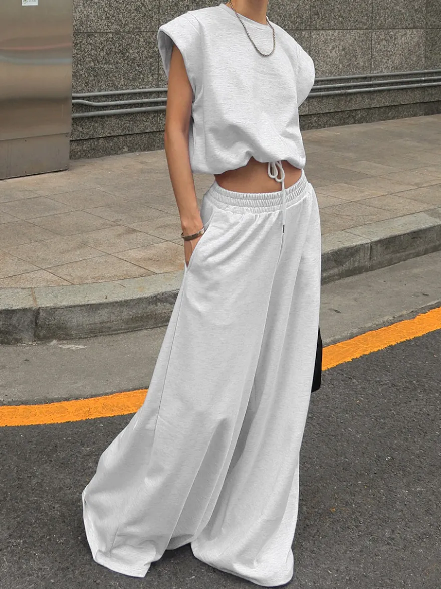 Ensemble lounge gris chiné : haut oversize à manches courtes et taille élastique pantalon large.