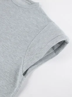 Ensemble lounge gris chiné : haut oversize à manches courtes et taille élastique pantalon large.