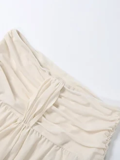 Ensemble 2 pièces : haut court à volants et décolleté en V jupe longue fendue et froncée