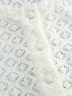 Gilet cardigan ajusté en maille ajourée avec manches évasées pour femme 2026