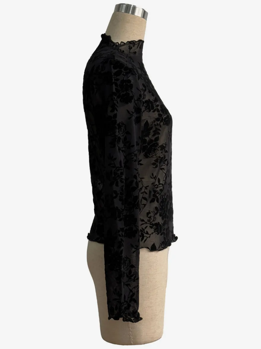 Haut moulant à col montant imprimé floral floqué manches longues transparentes style skinny collection femme 2026