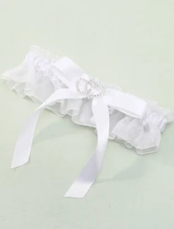 Jarretière mariage 2026 en satin avec strass et noeud