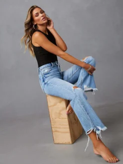 Jean large délavé pour femme - Pantalon en denim bleu clair taille haute ourlet brut coupe décontractée - Style streetwear décontracté printemps 2026