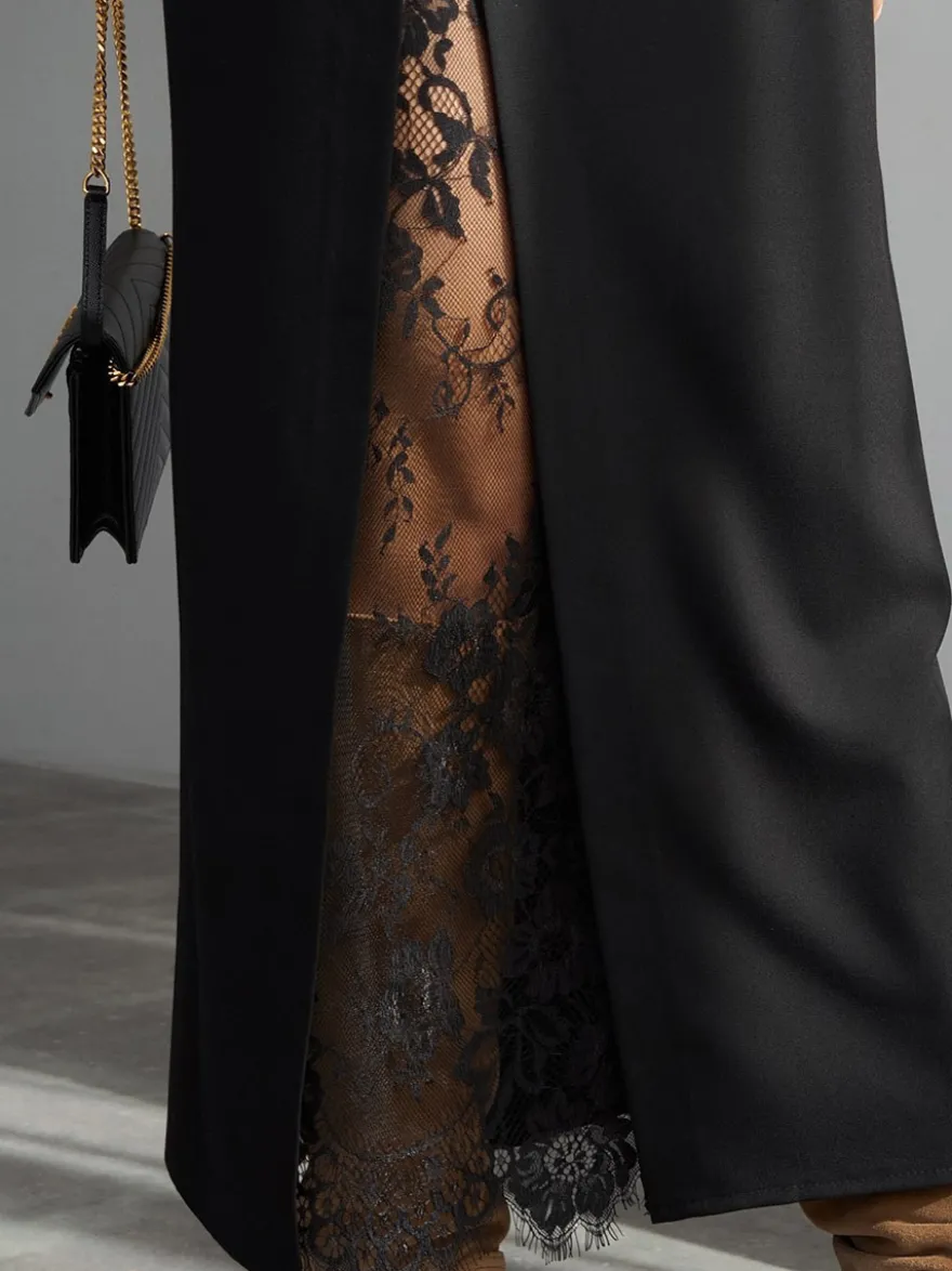 Jupe midi droite taille haute fendue sur le devant en dentelle