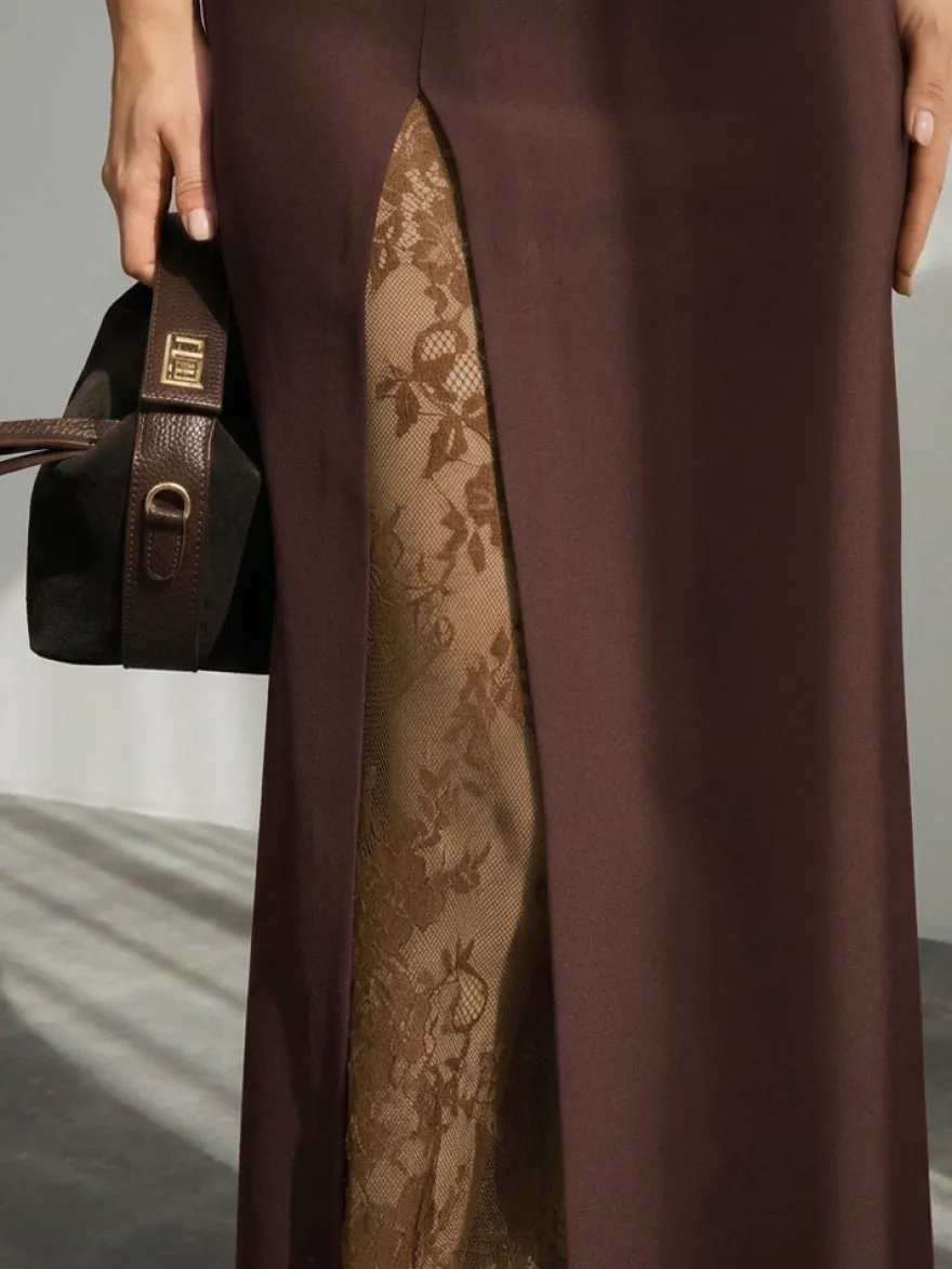 Jupe midi droite taille haute fendue sur le devant en dentelle