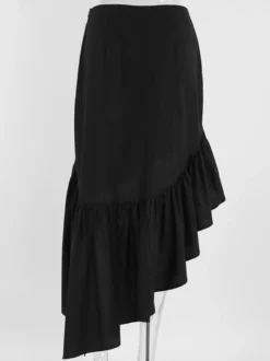 Jupe noire asymétrique mi-longue à volants et taille haute