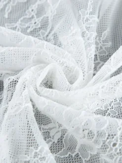 Jupes blanches en dentelle élégantes coupe asymétrique longueur genou bas pour femmes