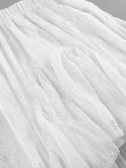 Jupes blanches en dentelle élégantes coupe asymétrique longueur genou bas pour femmes