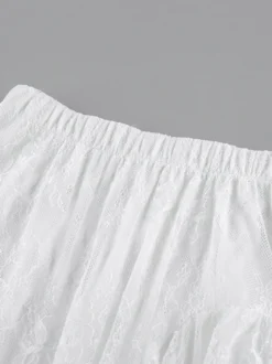 Jupes blanches en dentelle élégantes coupe asymétrique longueur genou bas pour femmes