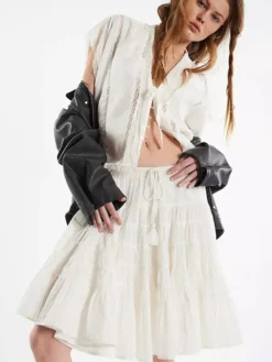 Jupes blanches plissées taille naturelle chic pour femmes