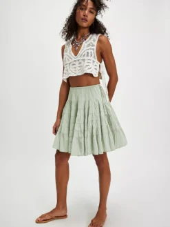 Jupes blanches plissées taille naturelle chic pour femmes