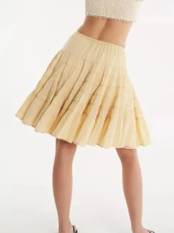 Jupes blanches plissées taille naturelle chic pour femmes