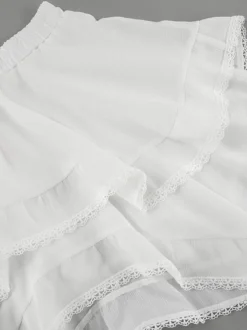 Jupes blanches taille haute élégantes mini pour femmes