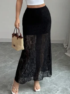 Jupes longues élégantes en dentelle noire à taille haute et transparente pour femmes