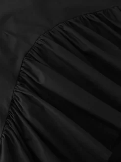 Jupes noires courtes asymétriques pour femmes