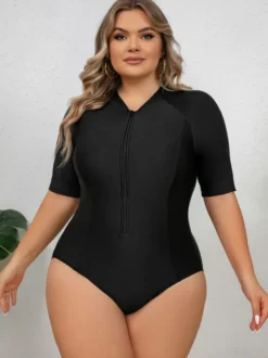 Maillot de bain anti-UV noir uni grande taille à manches mi-longues et fermeture éclair sur le devant