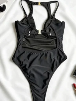 Maillots de bain une pièce noirs à col en V pour femmes parfaits pour l'été à la plage.