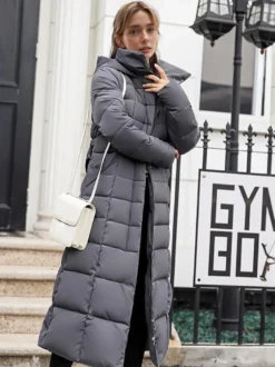 Manteau d'hiver à capuche avec col en fausse fourrure amovible et ceinture pour femme
