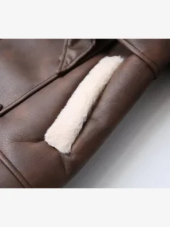 Manteau en cuir rétro oversize à bordure en peau lainée ceinture à la taille doublure peluche veste d'hiver