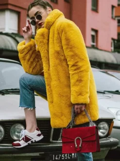 Manteau en fausse fourrure à revers crantés Veste longue chic et écologique pour femme 2026