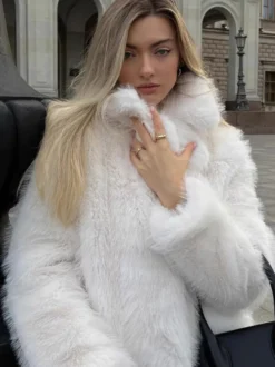 Manteau en fausse fourrure à revers crantés blanc Veste d'hiver écologique pour femme 2026