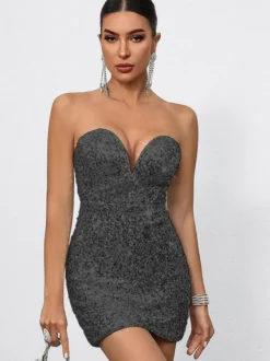 Mini-robe moulante à sequins décolleté en cœur et nœud dans le dos idéale pour les fêtes 2026