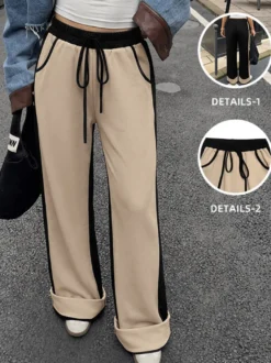 Pantalon de survêtement large à rayures latérales pour femme taille élastique avec cordon de serrage et poches.