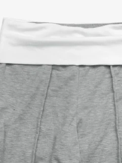 Pantalon en maille décontractée à taille haute et coutures avant color block taille large et coutures avant apparentes.