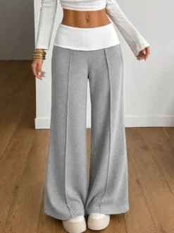 Pantalon en maille décontractée à taille haute et coutures avant color block taille large et coutures avant apparentes.