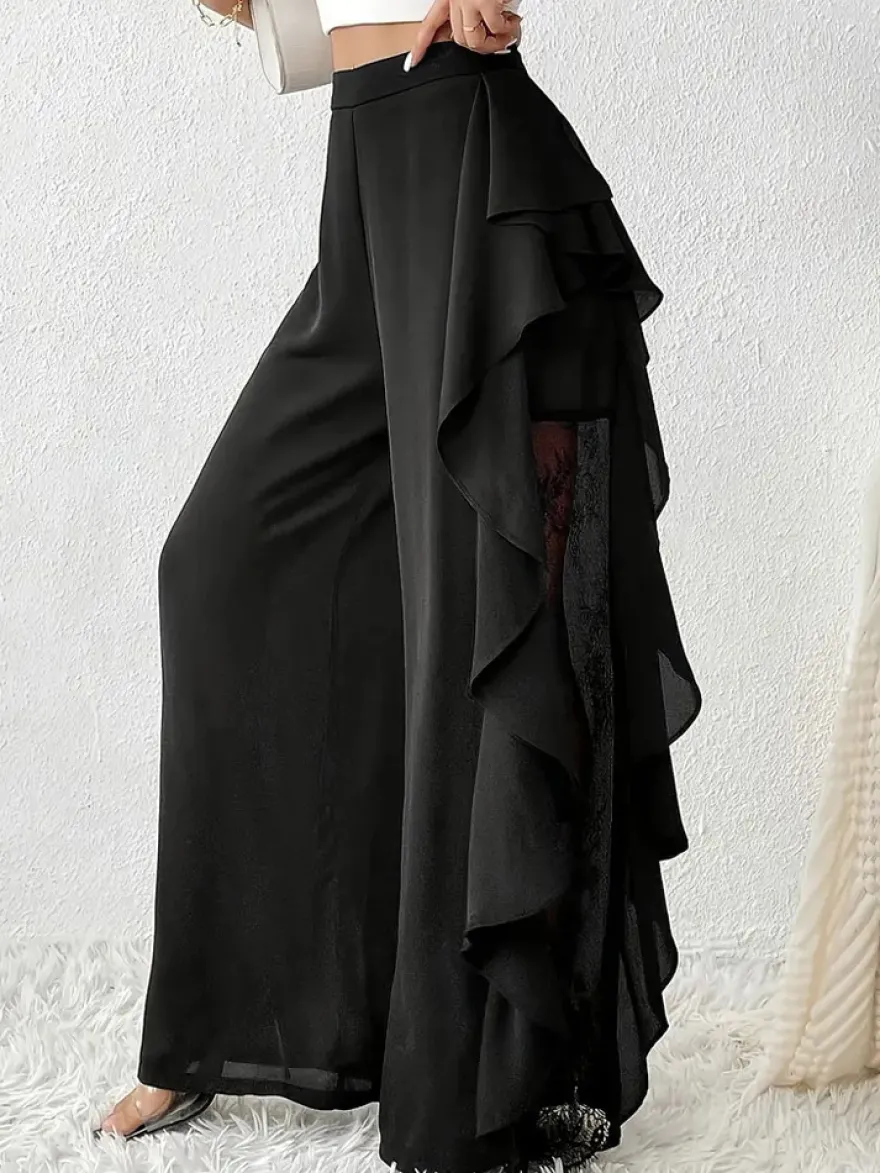 Pantalon noir uni à volants et taille naturelle idéal pour l'été