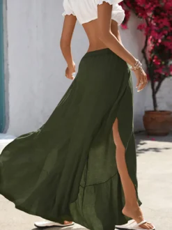 Pantalon palazzo fluide à taille haute élastique et fentes latérales pour femme idéal comme paréo de plage.