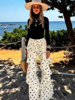Pantalon évasé à pois et volants superposés taille haute transparent jambes larges
