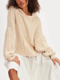 Pull à capuche en maille torsadée pour femme coupe ample manches longues style oversize style décontracté. Haut à capuche en grosse maille.