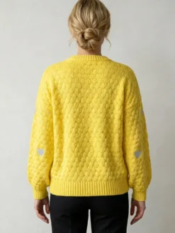 Pull à col rond en maille lâche manches longues motif jacquard à cœur style décontracté.