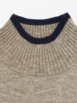 Pull en maille à col montant et bordures contrastées manches longues coupe ample uni