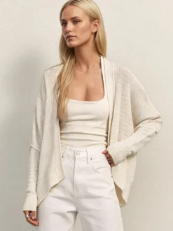 Pull oversize en maille ajourée col V manches chauve-souris ourlet asymétrique cardigan ouvert sur le devant