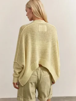Pull oversize en maille ajourée col V manches chauve-souris ourlet asymétrique cardigan ouvert sur le devant