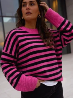 Pull rayé à col rond en maille manches longues amples style décontracté pour femme.