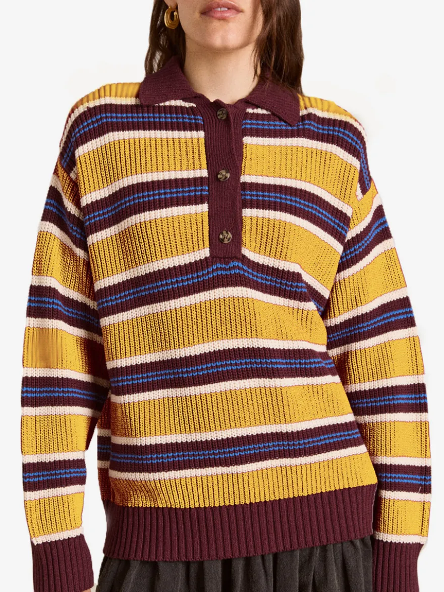Pull à rayures rétro à col polo pour femme demi-boutonné coupe ample et oversize en maille.