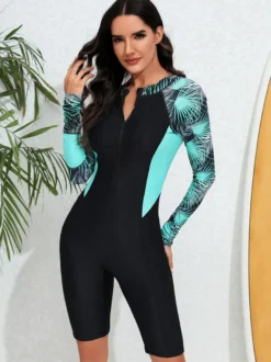 rashguard à manches longues raglan à imprimé palmiers et fermeture éclair sur le devant